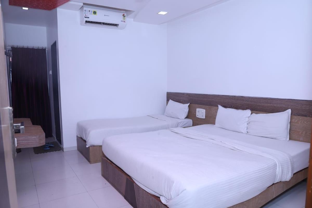 Hotel Kewal Inn Jalgaon Bagian luar foto
