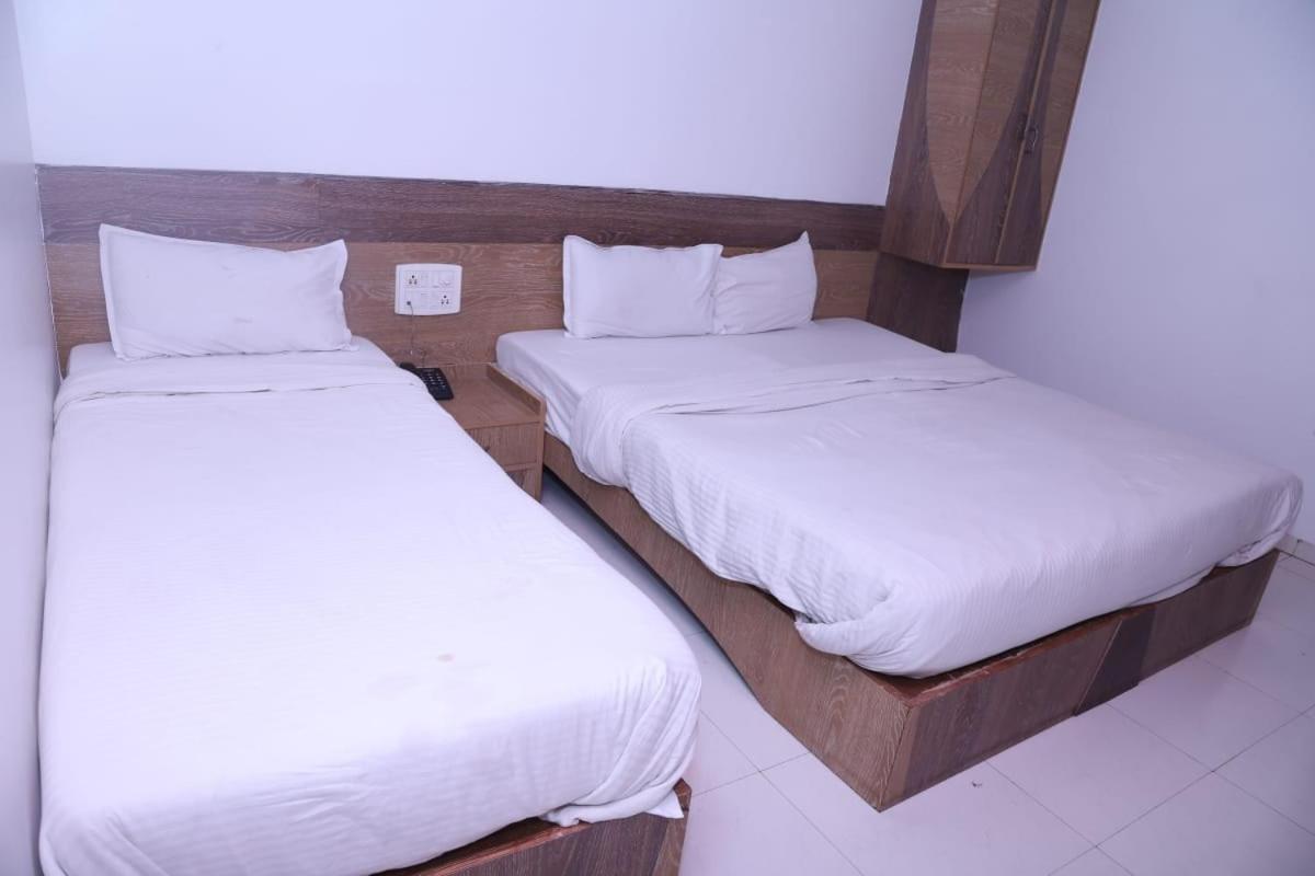 Hotel Kewal Inn Jalgaon Bagian luar foto