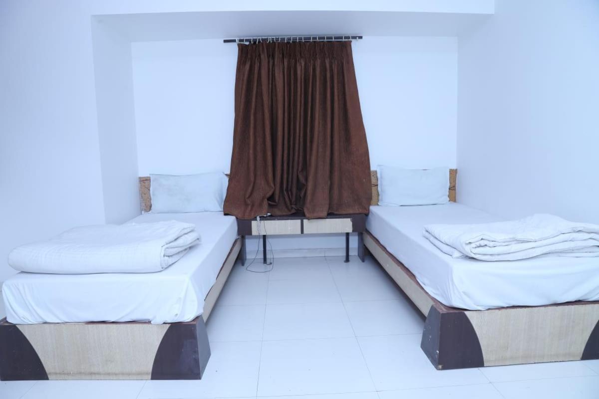 Hotel Kewal Inn Jalgaon Bagian luar foto
